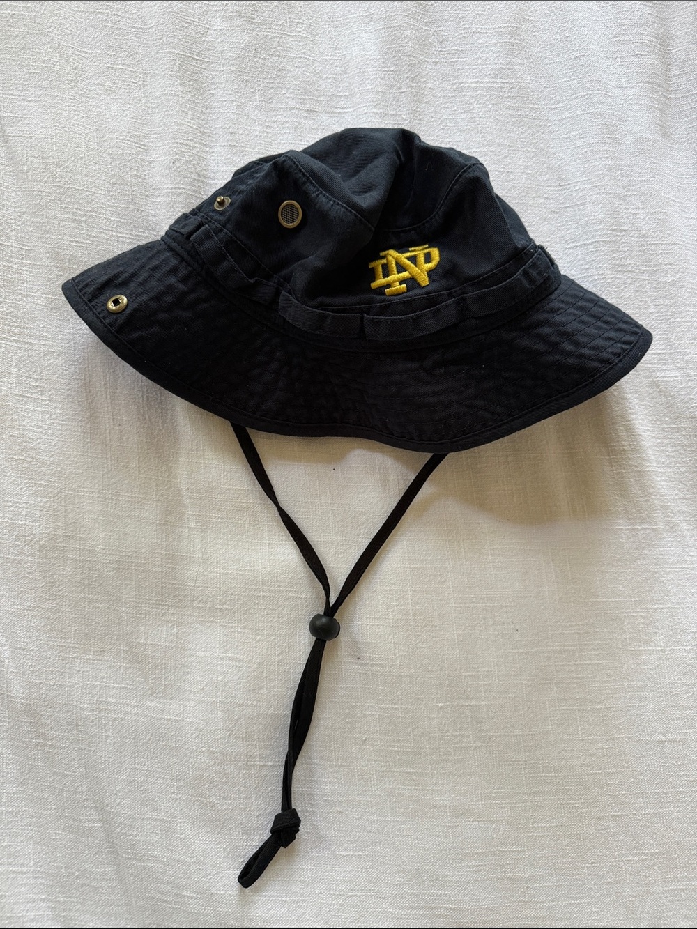 Top of the World Notre Dame Navy Bucket Hat with Yellow Embroidered Logo
